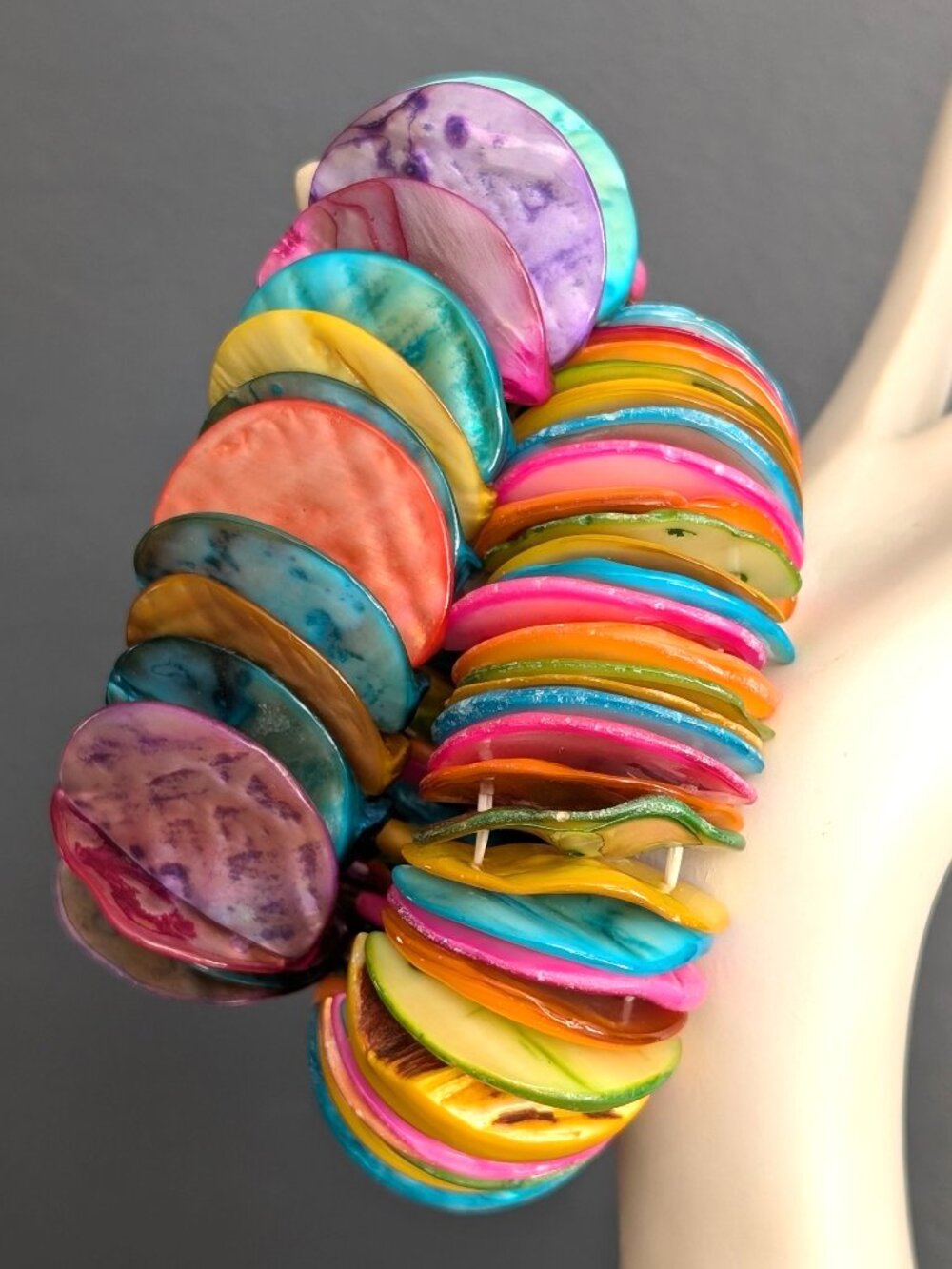 2 brightly dyed stretch shell bracelets